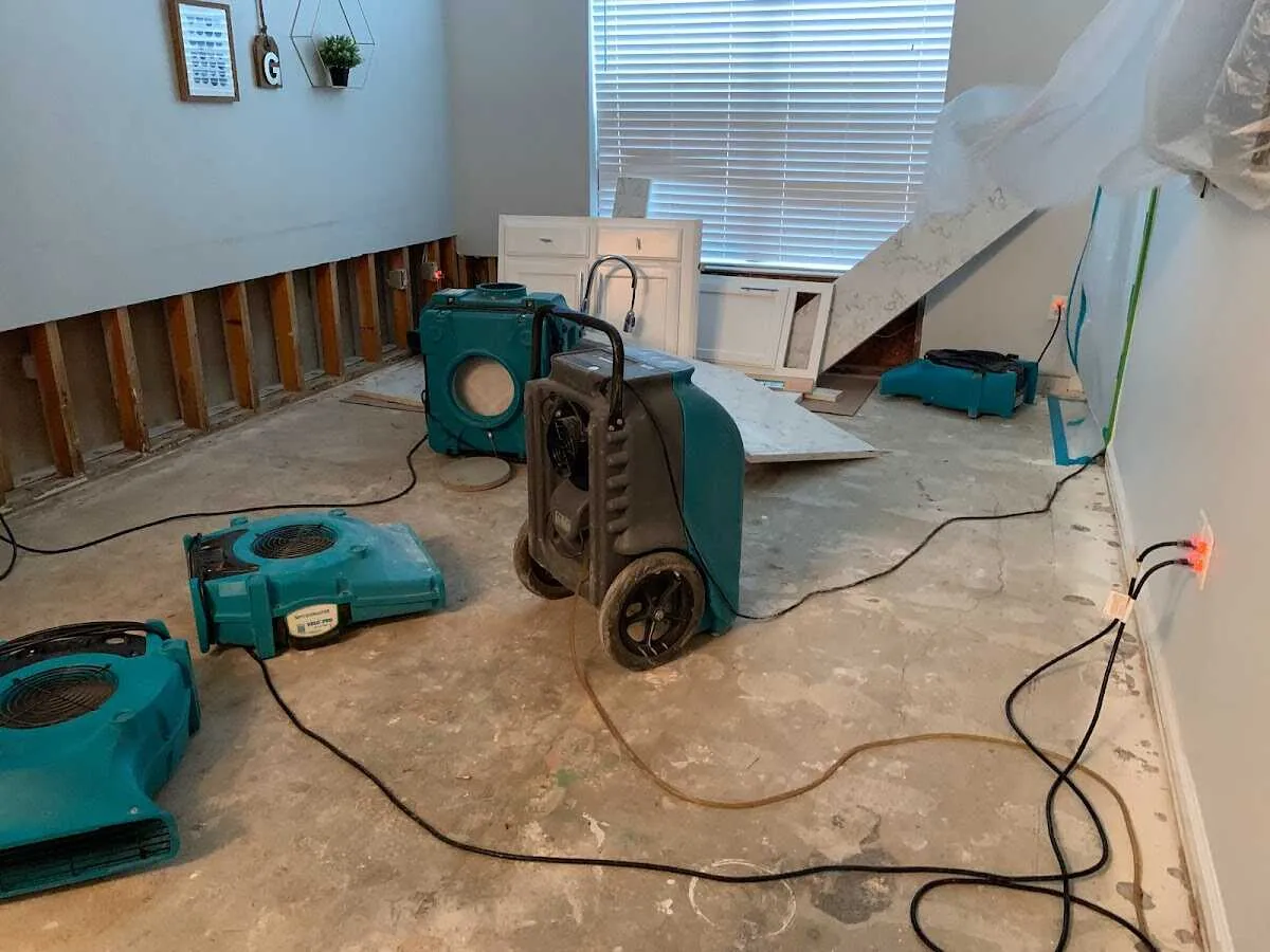 Dehumidifier in flood-cut room for Water Damage Restoration in Midvale